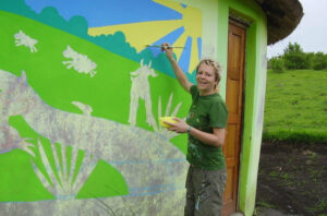 Sarah Painting a Rural Pre School